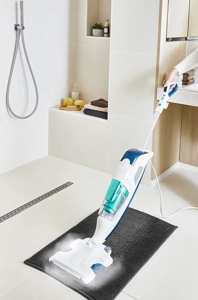 Rowenta Bodendampfreiniger Clean & Steam Revolution RY7757 | 2 In 1 Reingung | Verdampfer Für ätherische Öle | Alle Bodenarten | Anti-Kalk-Kartusche | Weiß/Blau 9 Rowenta Bodendampfreiniger Clean & Steam Revolution RY7757 | 2 In 1 Reingung | Verdampfer Für ätherische Öle | Alle Bodenarten | Anti-Kalk-Kartusche | Weiß/Blau – Bild 7